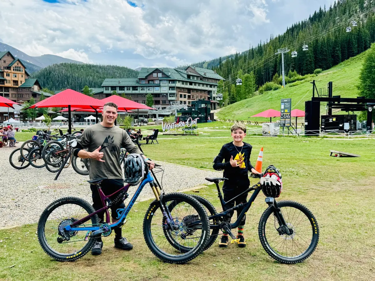 Dr. Mason Steen mountain biking with his son
